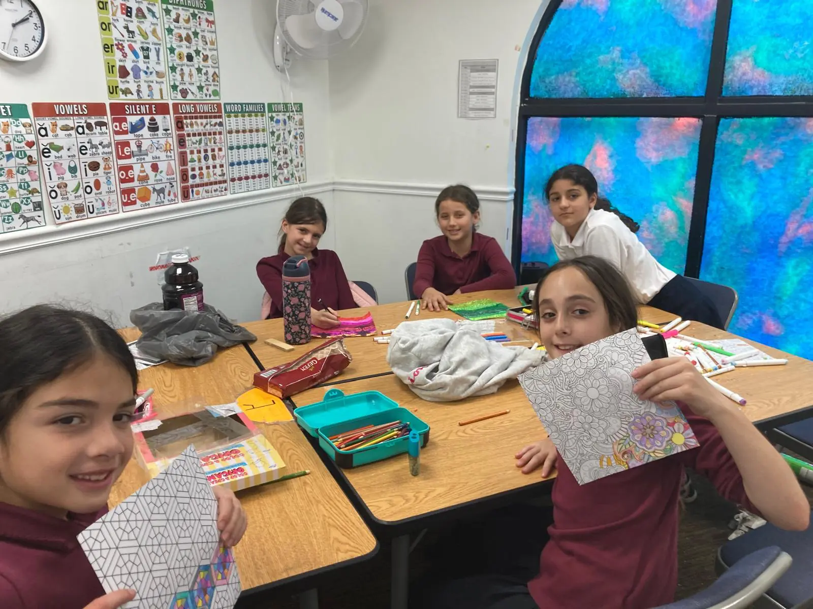 Talmidos coloring and creating in class