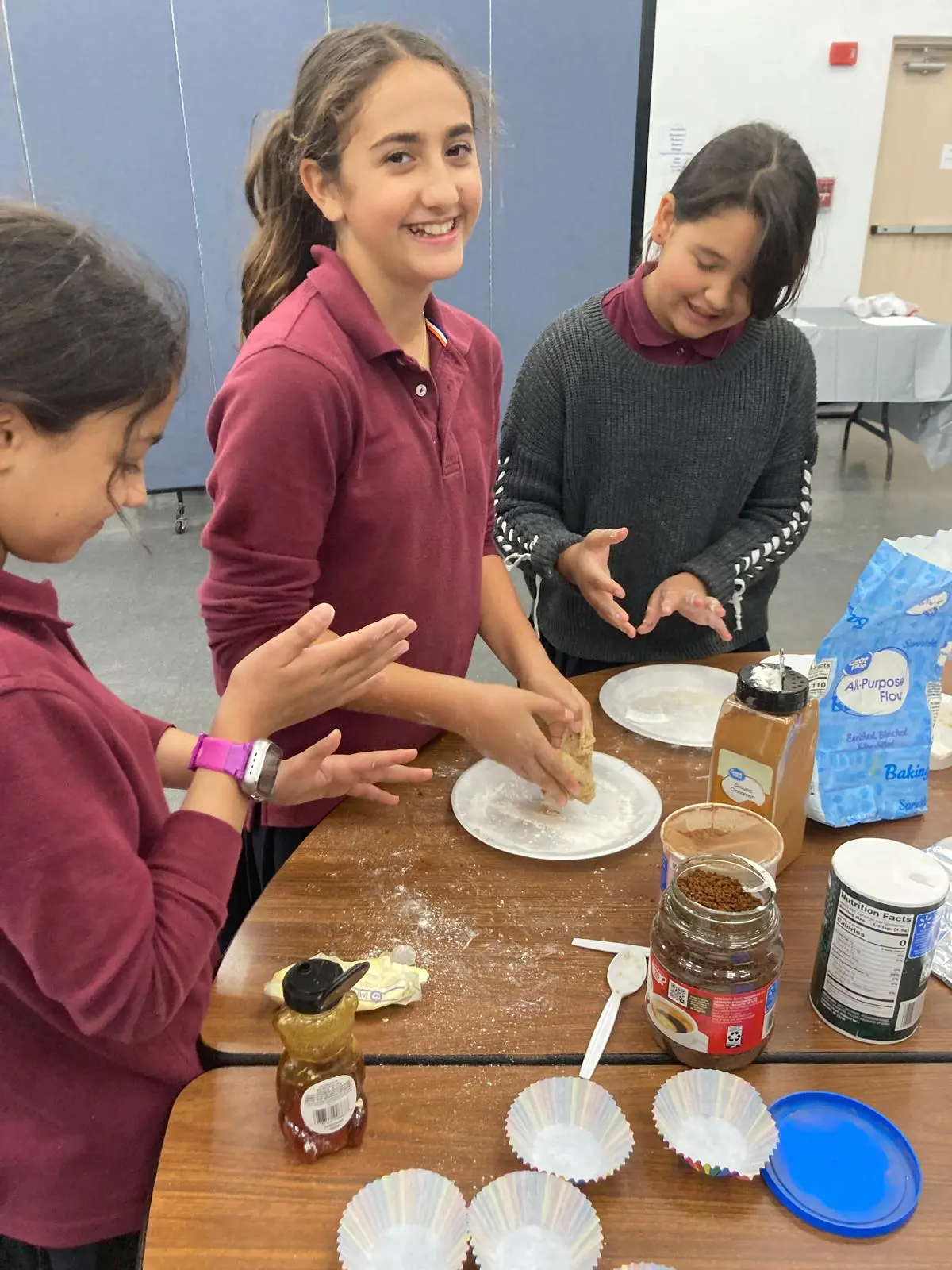 Talmidos baking together in the lunchroom