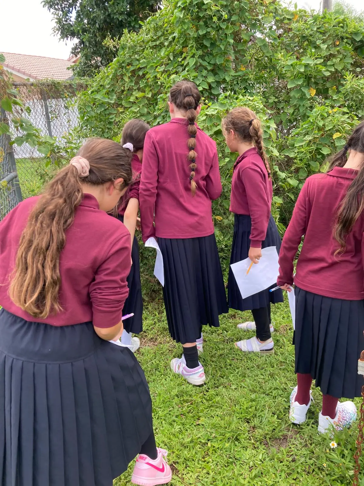 Talmidos exploring outside during a nature lesson